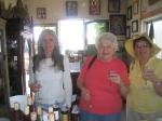 The three amigos tasting wine.