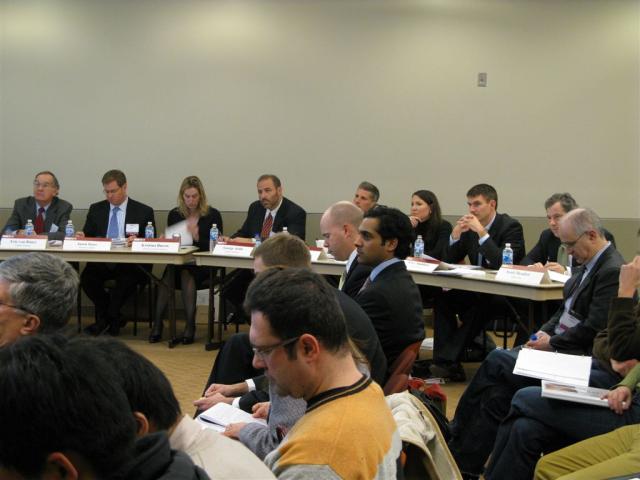 The judges listen in on the teams' final presentations