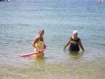 Aunt Marie and Grandma Bet in the water