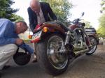 Pete and Dad check out Pete's new motorcycle