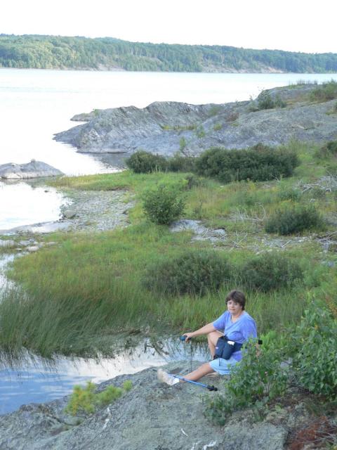 Anne geocaching at Wachusett Reservoir