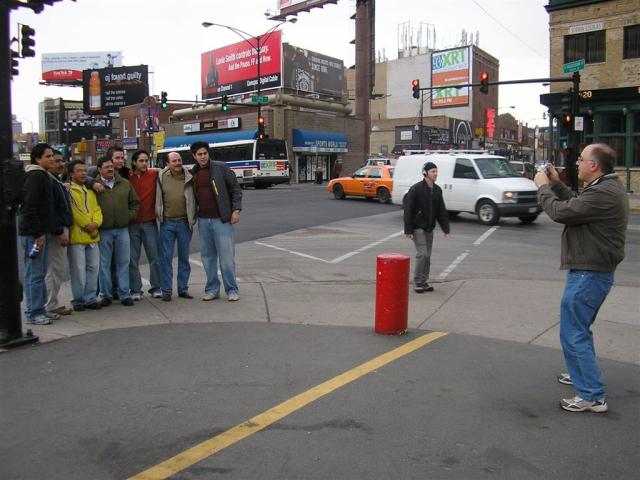 Dad taking pictures for people at Wrigley