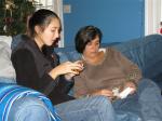 Maggie and Aunt Kate read questions for Trivial Pursuit