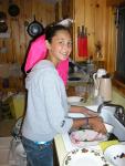 Maggie doing dishes